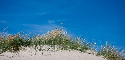 ferien meer-strand duene-himmel urlaub Symbol